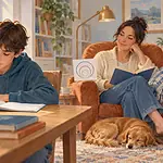Teenager working independently while a caregiver remains available nearby