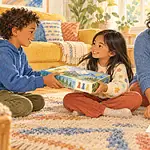 Siblings and caregiver making a clear return plan for a borrowed board game